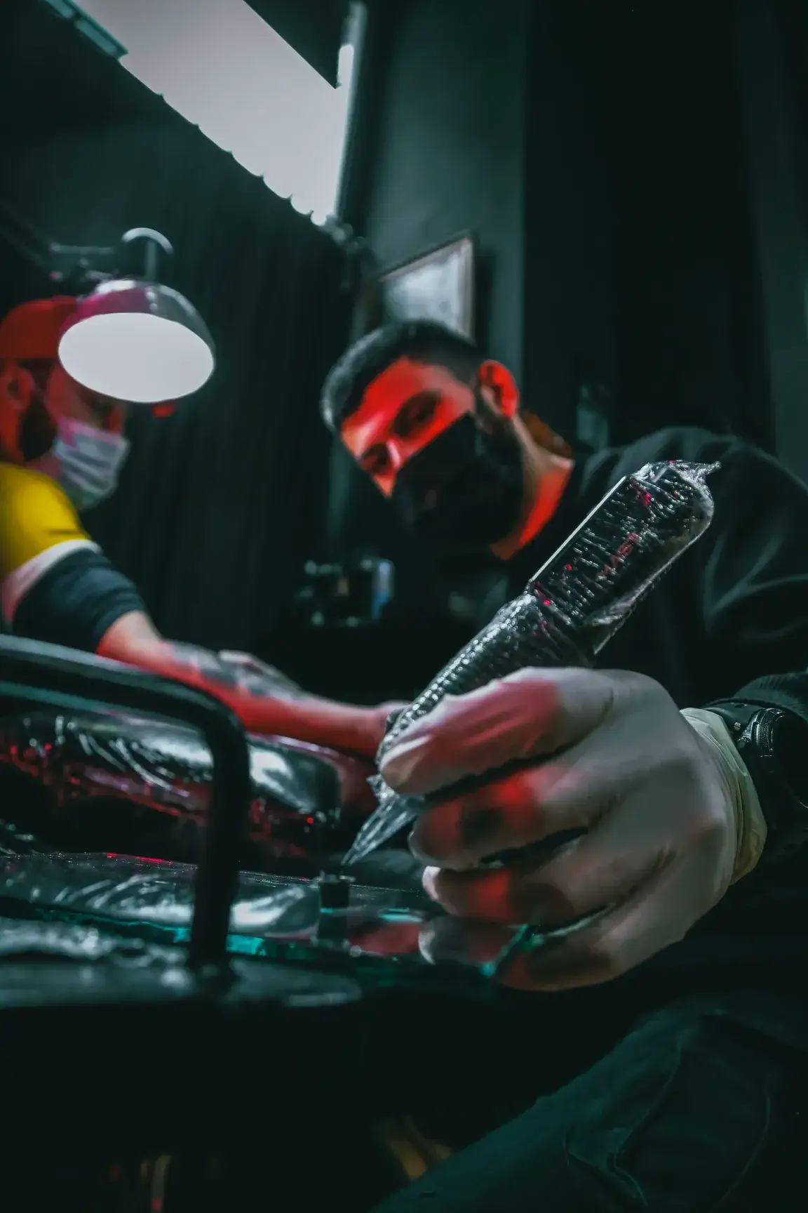 Man making tattoo